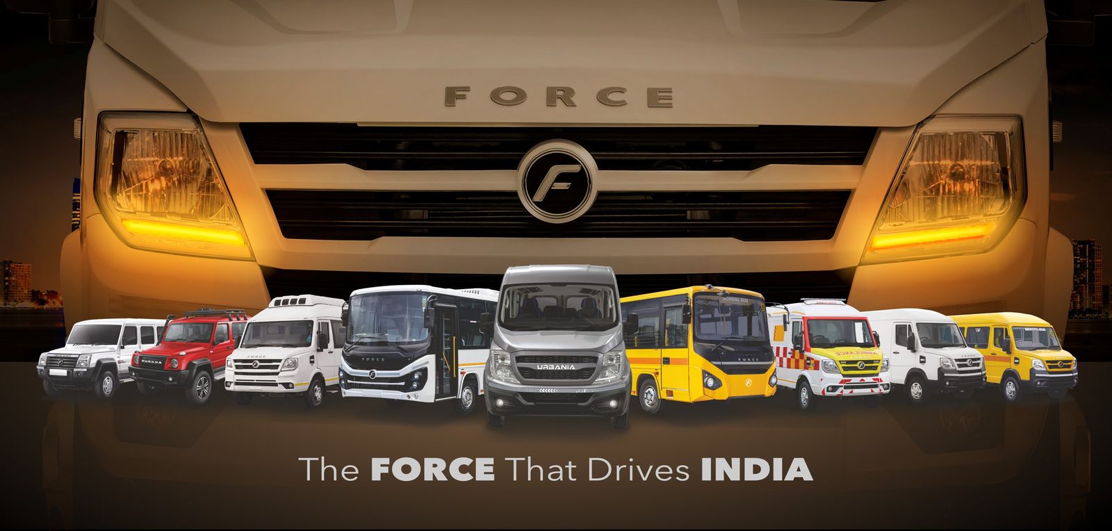 The Force Motors range in front of a Traveller grille: Gurkha, Traveller, Monobus, Urbania, school buses, ambulance and delivery van. The Force that drives India.